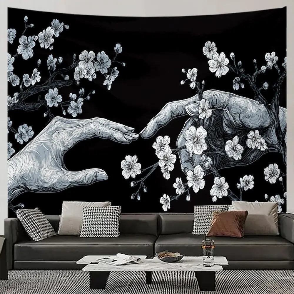 Black and white floral hand tapestry – hand reaching among blooming flowers and leaves dark boho wall hanging