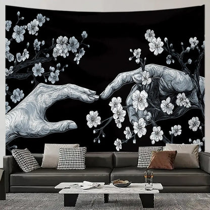 Black and white floral hand tapestry – hand reaching among blooming flowers and leaves dark boho wall hanging
